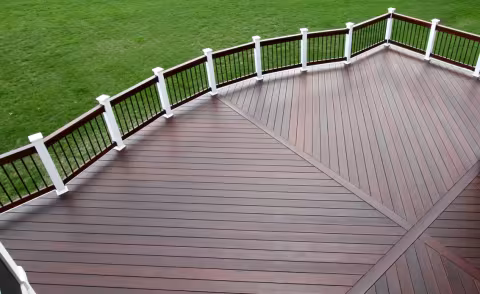 Multi-angle brown deck with white posts and black railings